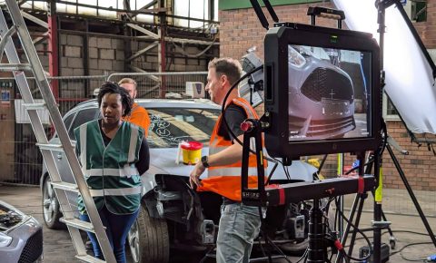 camera crew behind the scenes while filming at UPI yard