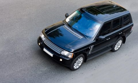 most luxurious brand of british suv drive on road isolated part of "luxury cars" series